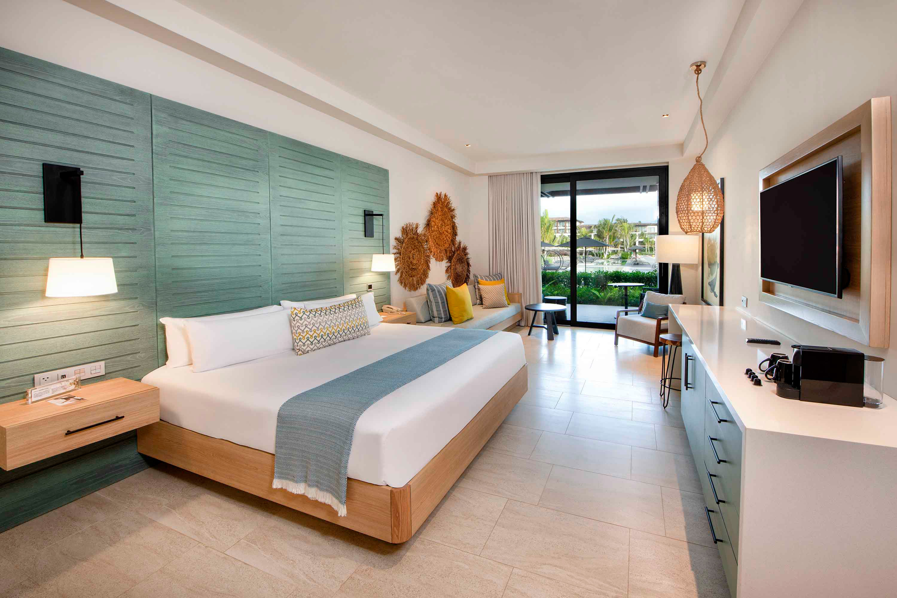 cama resort king pool view junior suite lopesan costa bavaro resort spa & casino