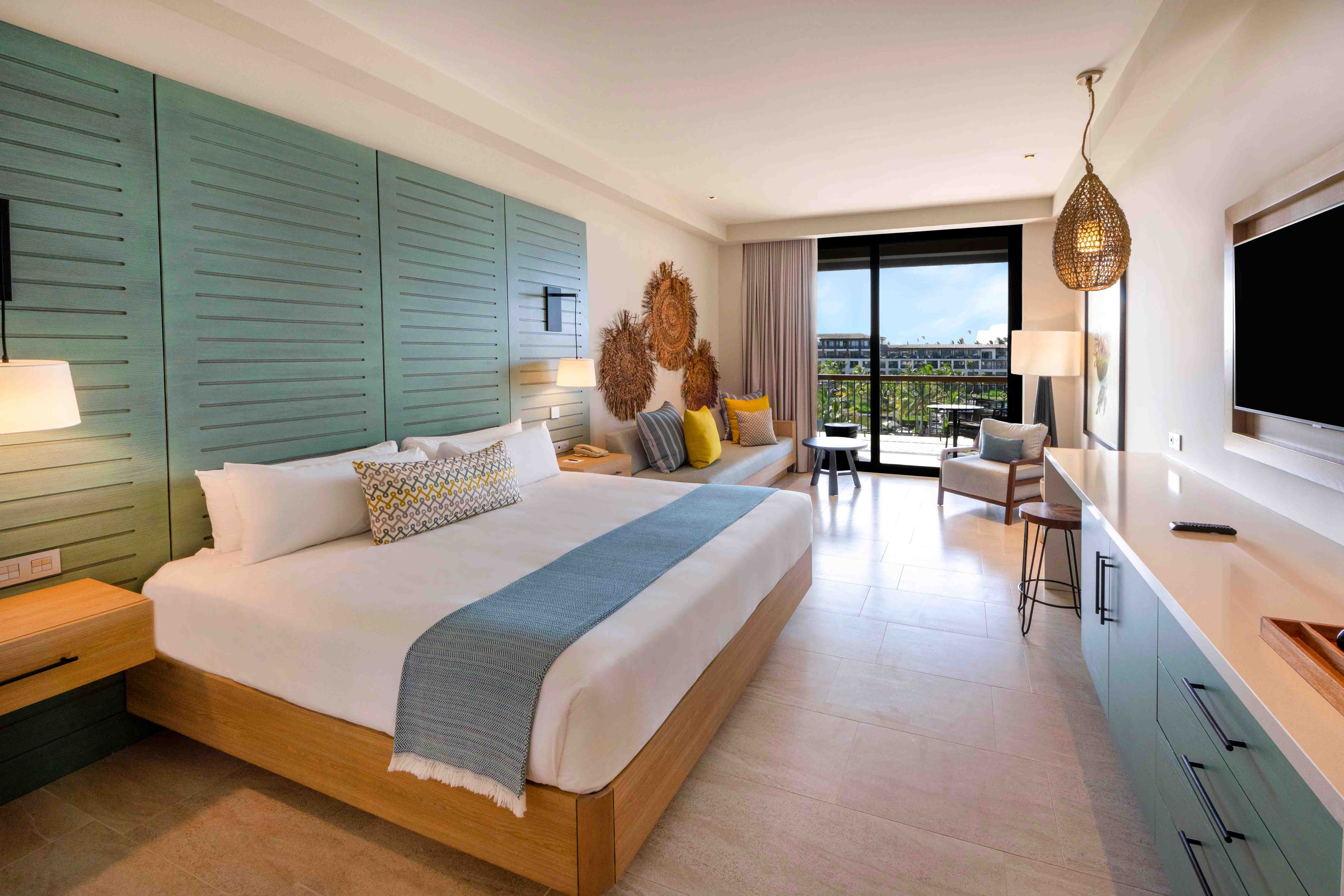 cama unique king ocean view junior suite lopesan costa bavaro resort spa & casino