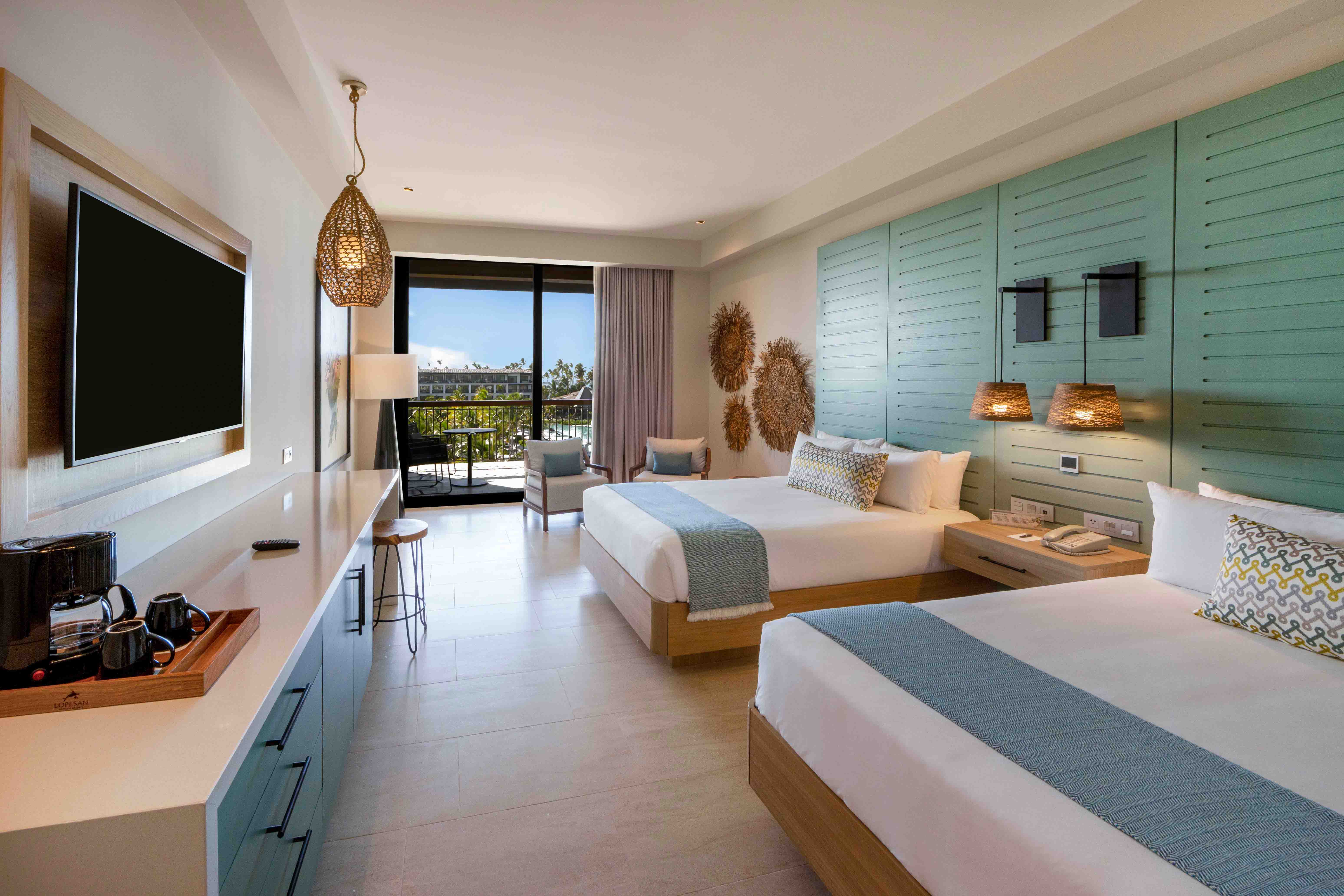 cama unique queen ocean view junior suite lopesan costa bavaro resort spa & casino
