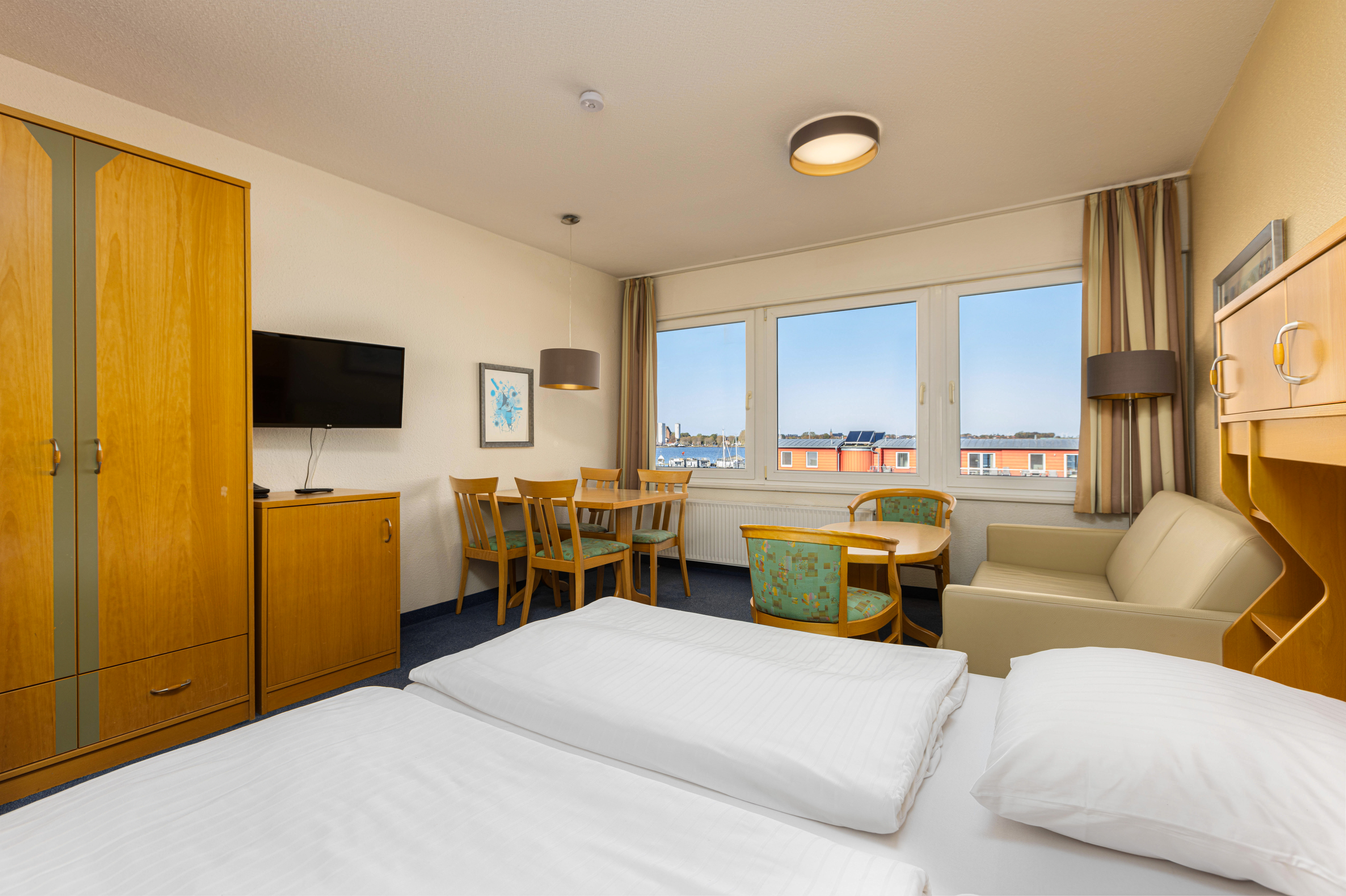 fotos cama apartamento yachthafen habitaciones hotel ifa fehmarn