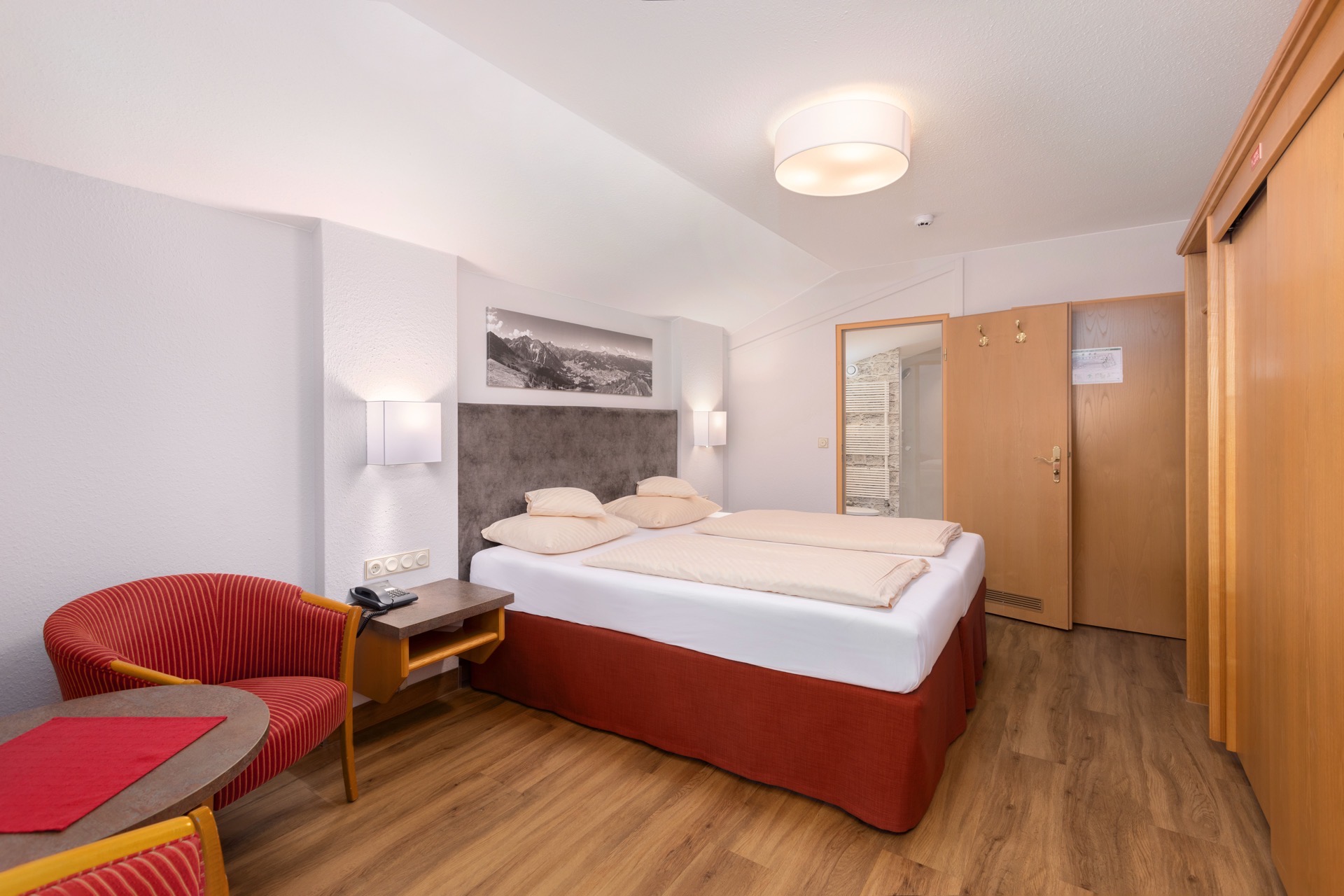 cama habitación doble estándar ifa alpenrose hotel