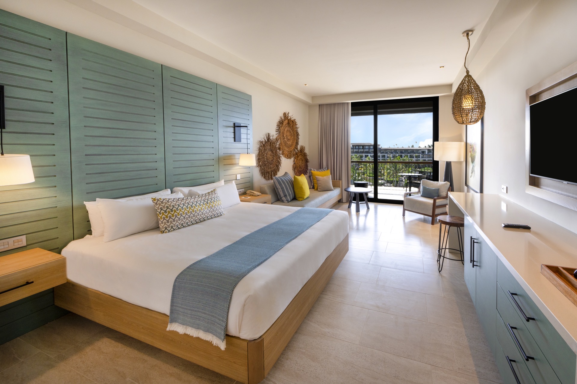 cama unique king ocean view junior suite lopesan costa bavaro resort spa & casino